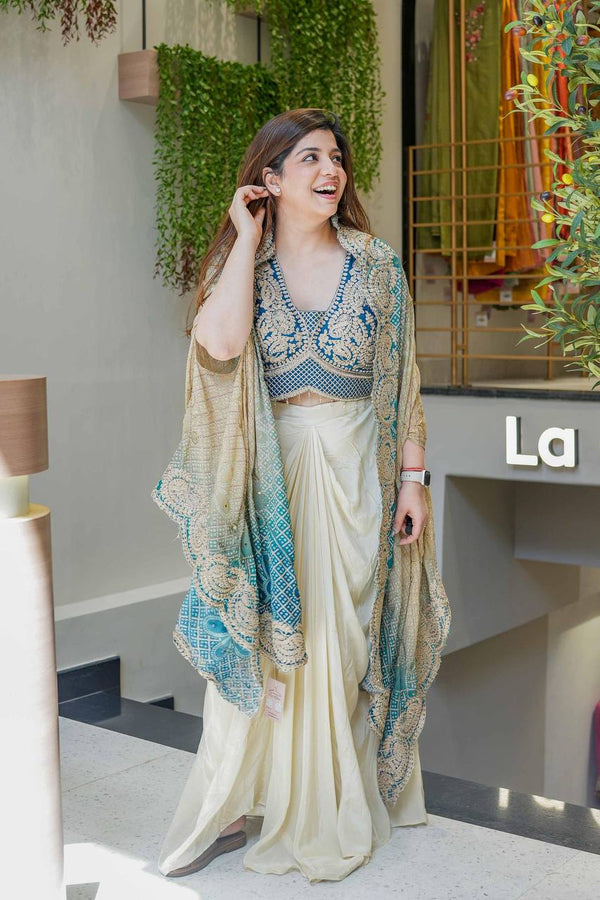 Ivory Saree Gown Set with Intricate Embroidery and Contrast Bandini Style Dupatta Cape