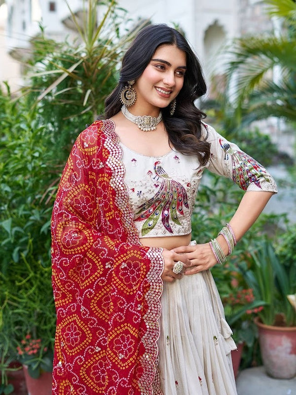 Ivory Lehenga with Multicolor Peacock Embroidery and Red Bandhej Dupatta