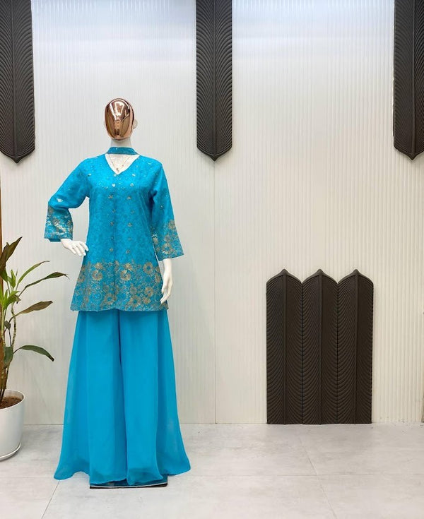 Teal Blue Embroidered Sharara Suit with Floral Net Dupatta Elegant Ethnic Wear for Wedding Occasions