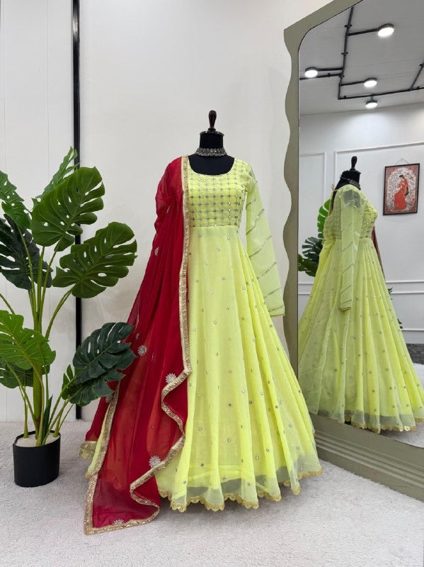 Radiate Elegance in This Lime Yellow Mirror Work Anarkali with Hot Pink Dupatta